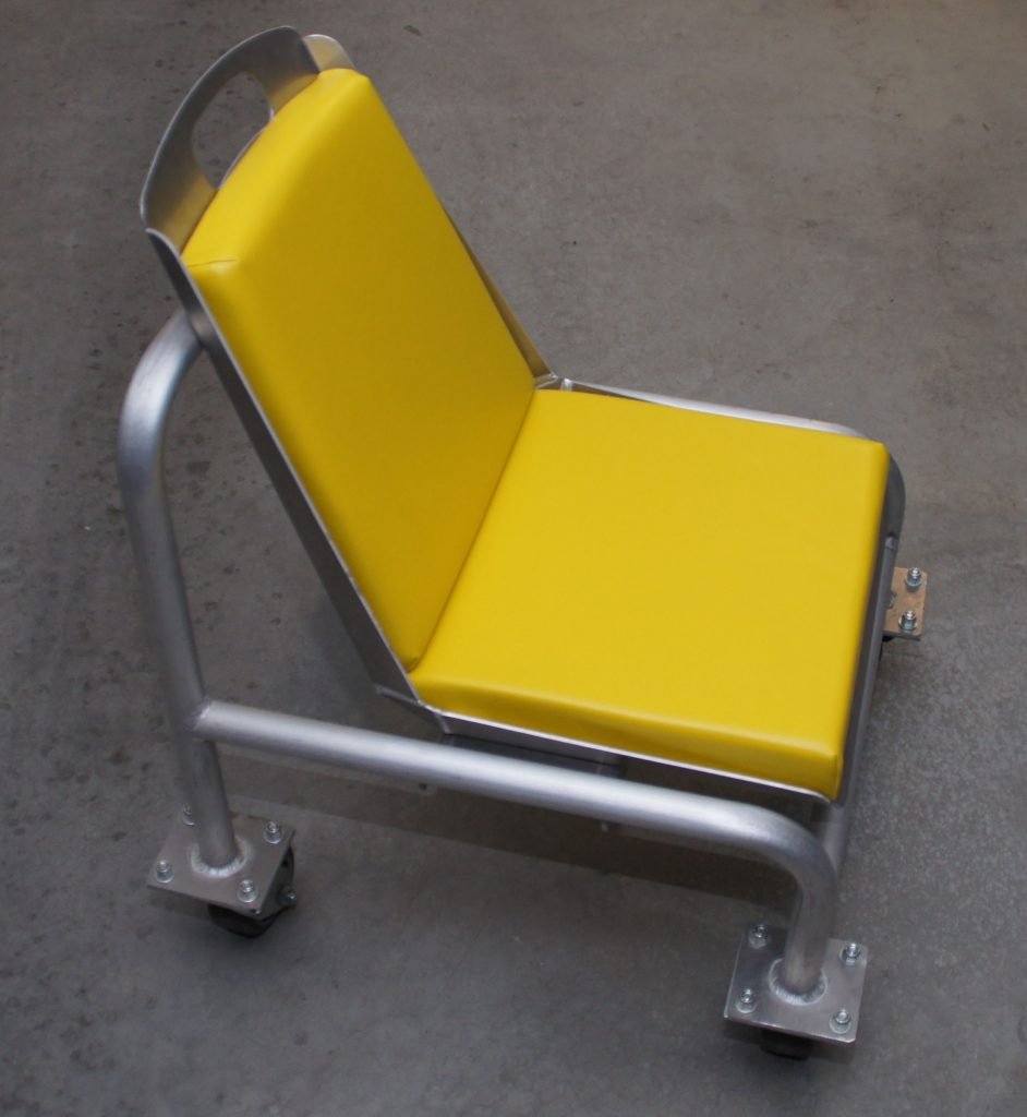 Rolling Mechanic Seat reduces back strain. Blue SteelCo, Inc.